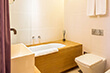 Bathroom interior in a Deluxe Room at the Dome Hotel in Riga
